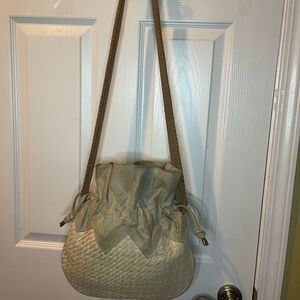 Sondra Roberts leather woven green &tan bucket style draw string shoulder bag